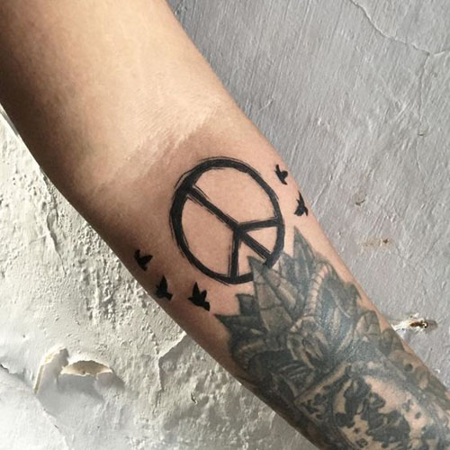 I migliori disegni del tatuaggio della pace 9