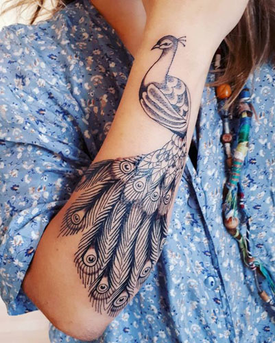 Mejores diseños y significados de tatuajes de pavo real 6