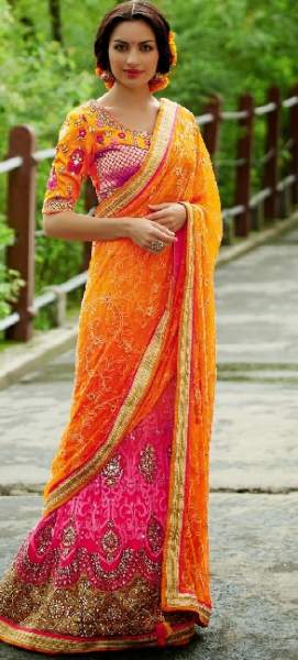 El diseñador Sari de color naranja y rosa