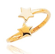 Anello da punta in oro con stella in rilievo