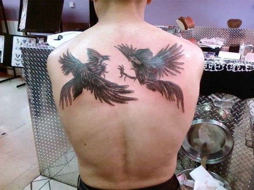 Disegno del tatuaggio del gallo guerriero