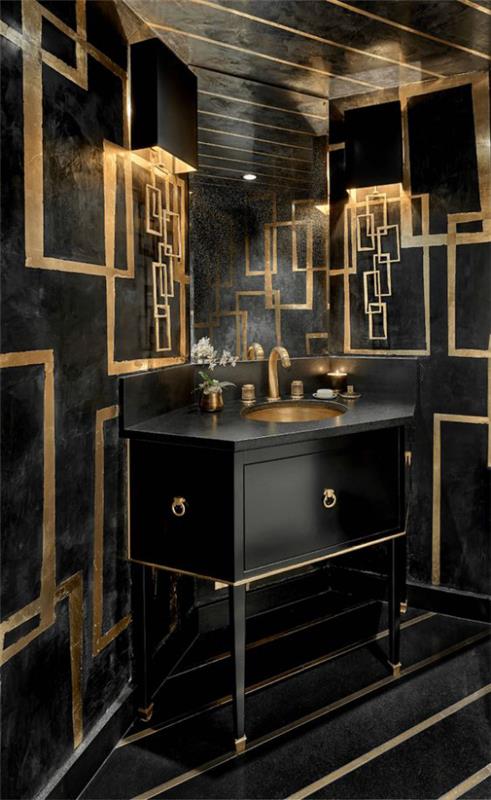 חדר אמבטיה באריחי שחור וזהב שחור מנורות אבזור שחורות בצבע זהב