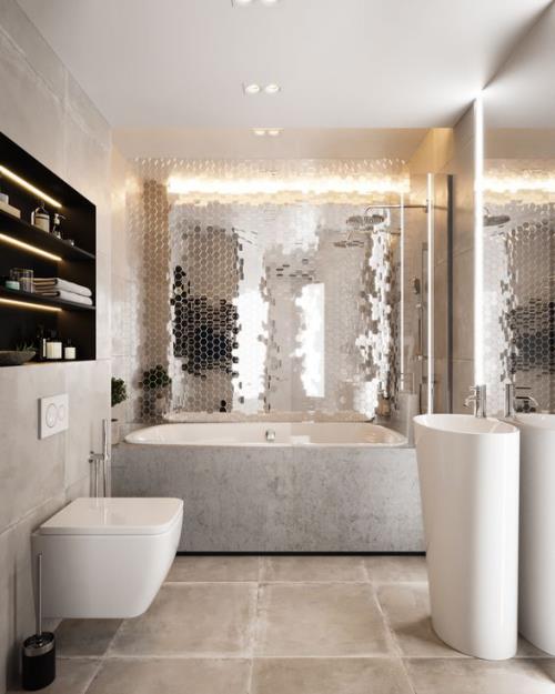 מבטאי אריחים בחדר האמבטיה מעצבים יצירתיות ותעוזה קיר עם אריחים מחזירי אור ומתפעלים מאפקט הנוצץ