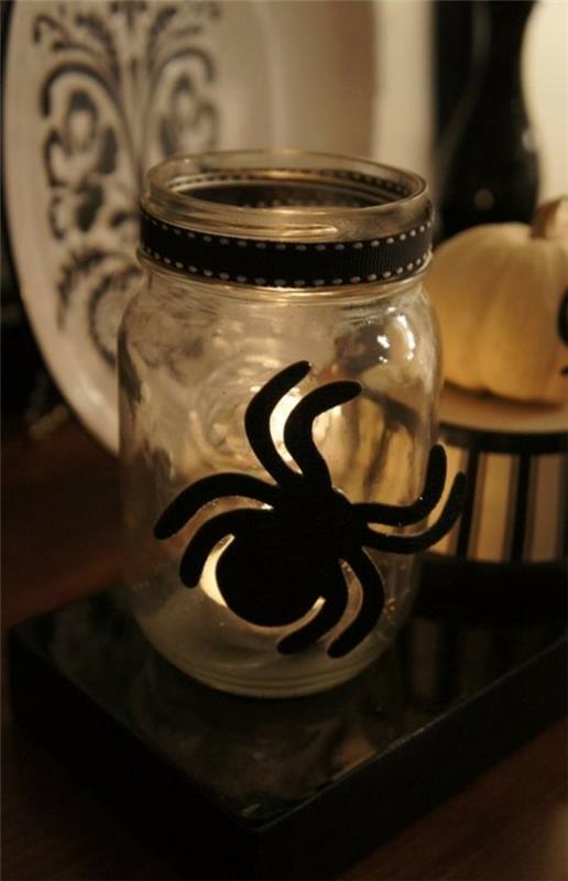 רעיונות לקישוט ליל כל הקדושים זכוכית שחורה עכביש