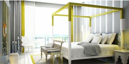 מיטות אפיריון במסגרת חדר השינה בצבע צהוב
