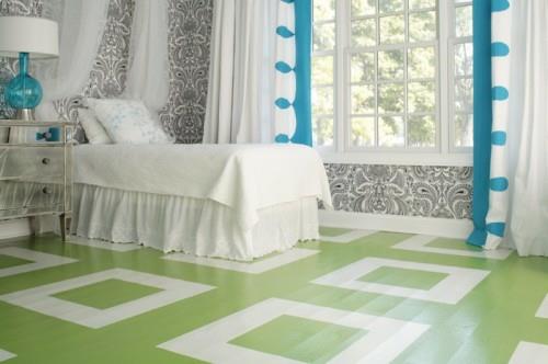 חדר שינה צבוע בצבע ירוק לבן