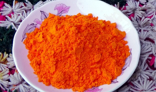 Polvo de naranja rangoli