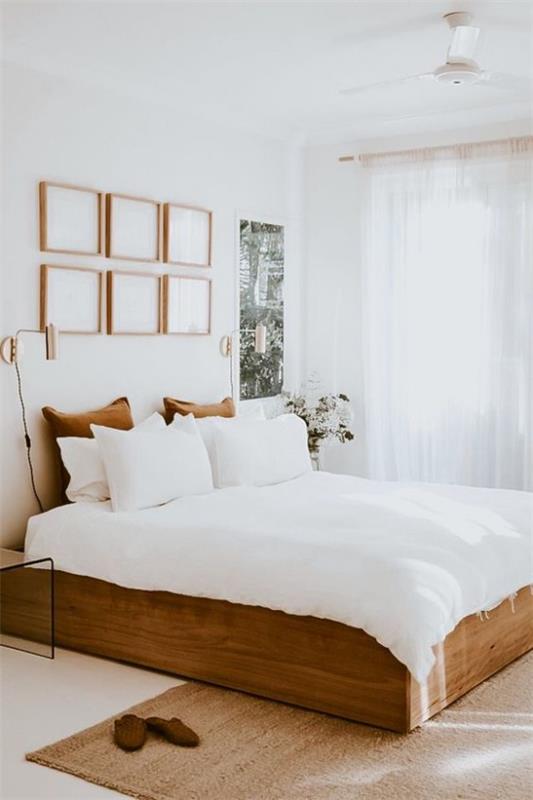 חדר שינה קטן להרחיב באופן ויזואלי מיטת שינה מעץ לבן כריות כריות חלון קישוט קיר הרבה אור