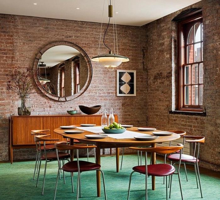 ריהוט לופט חדר אוכל עיצוב קיר לבנים רצפה ירוקה מראה קיר עגולה