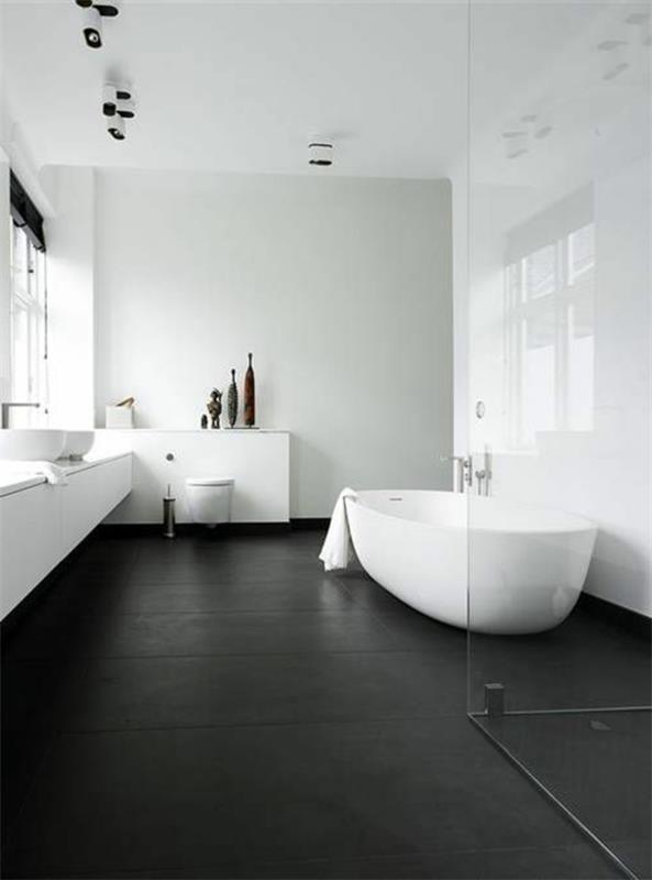 חדר אמבטיה מודרני קירות בהירים רצפה כהה