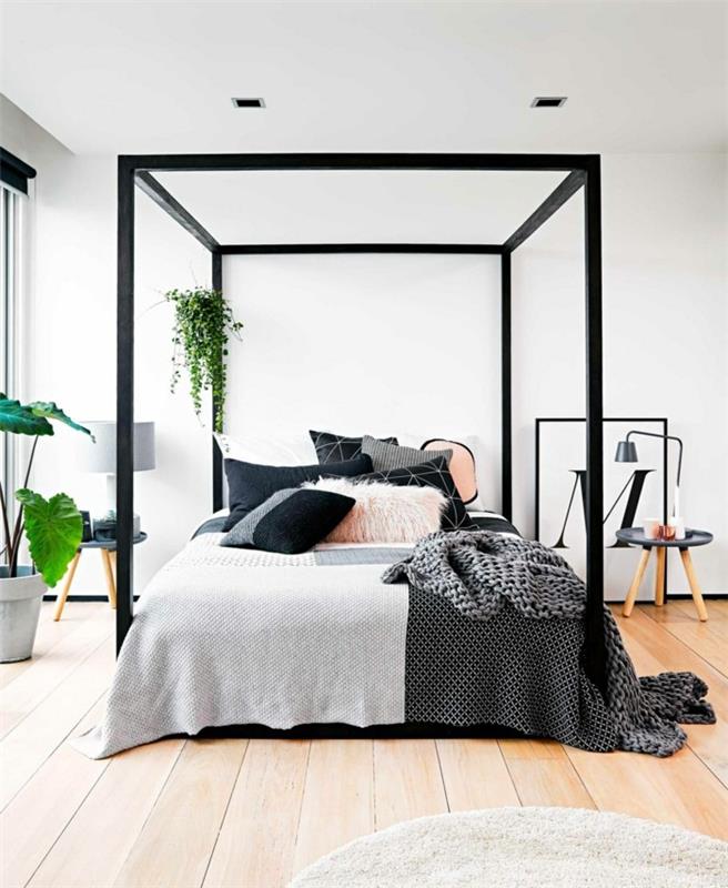 חדר שינה מודרני בדוגמאות בד יפות משלבות כריות לזריקת רצפת עץ