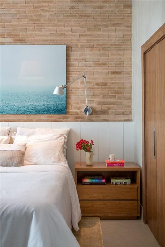 עיצוב חדר שינה לבנים קיר אופטיקה עץ קונסולת לילה אמנות קיר