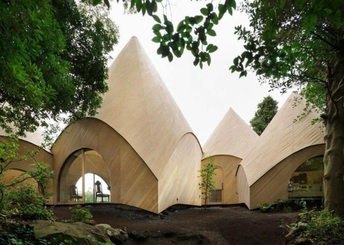 אוהל טיפי בתים מודרניים עץ בטון בנייה אקולוגית