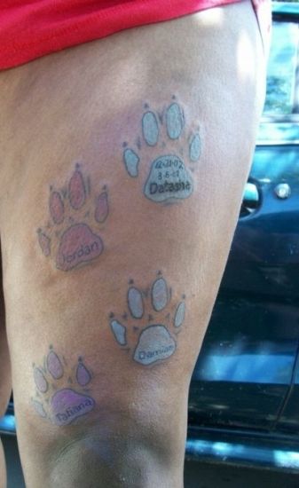 Disegno del tatuaggio di impronte di zampe di cane