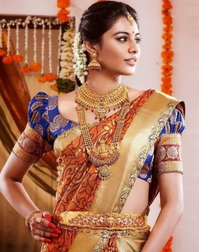 Il design della camicetta in sari di seta da sposa pesante dell'India meridionale