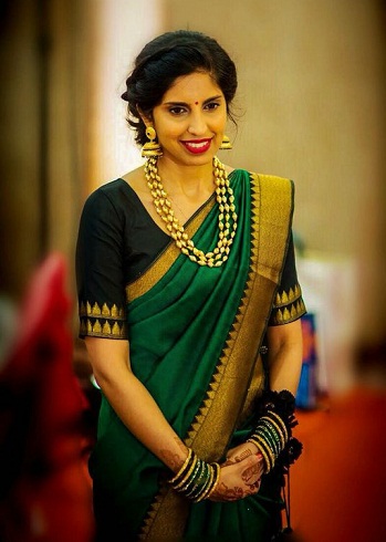 La migliore camicetta firmata per sari di seta verde