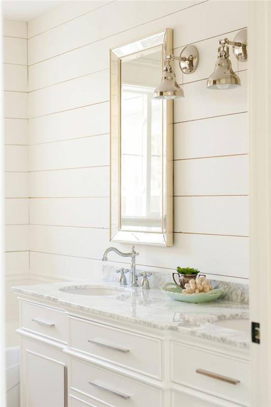 צבעי קיר לבן במיוחד בחדר האמבטיה גורמים לחדר להיראות בהיר ומרווח