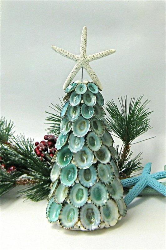 קישוט חג המולד עצי אשוח עשויים מקליפות כוכב ים פוינסטיה