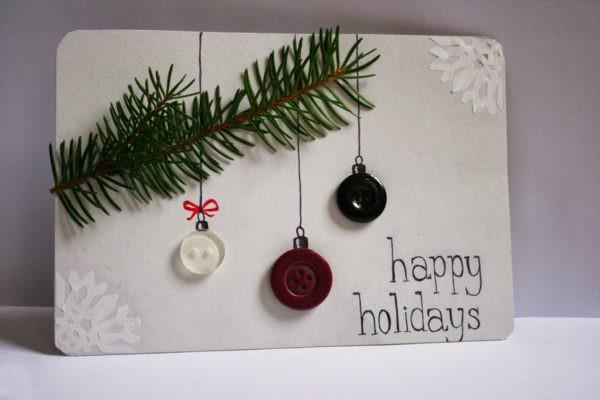 כרטיסי חג המולד מתעסקים עם שלושה כפתורים